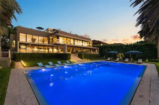 a view of a swimming pool with lounge chair