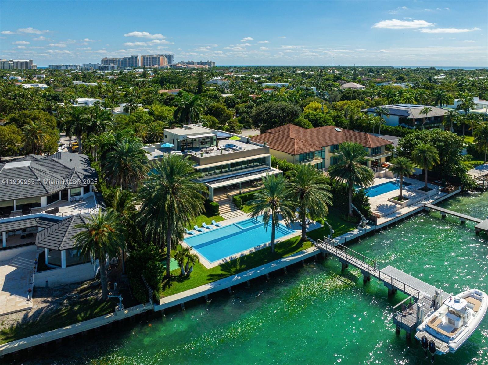 360 Harbor Drive Key Biscayne, FL 33149 - Photo 18 of 86 an aerial view of residential houses with outdoor space and trees