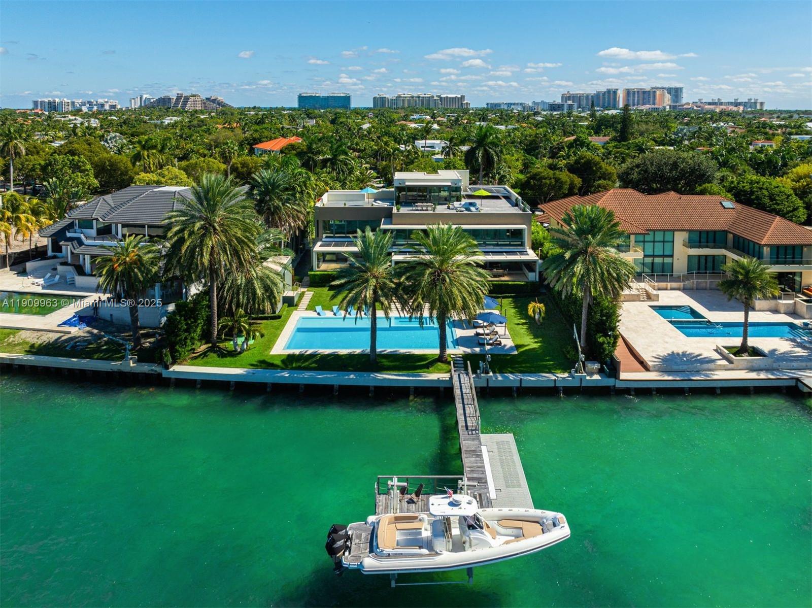 360 Harbor Drive Key Biscayne, FL 33149 - Photo 19 of 86 a view of a table and chairs in the patio