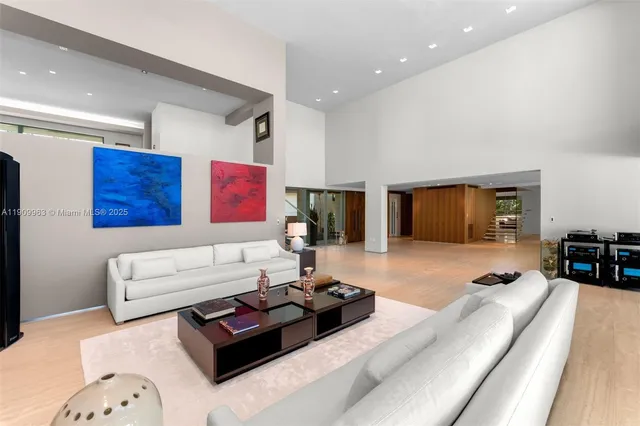 a bedroom with furniture and a potted plant