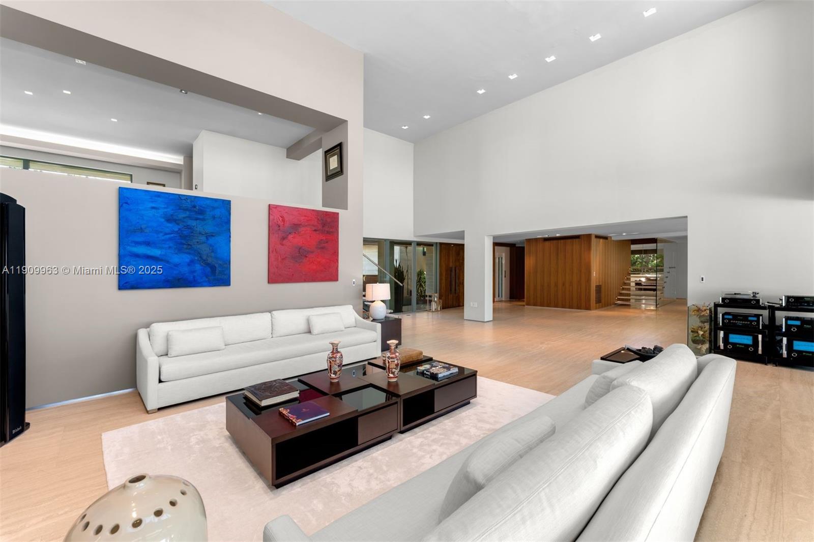 360 Harbor Drive Key Biscayne, FL 33149 - Photo 34 of 86 a living room with furniture ceiling fan and a wooden floor