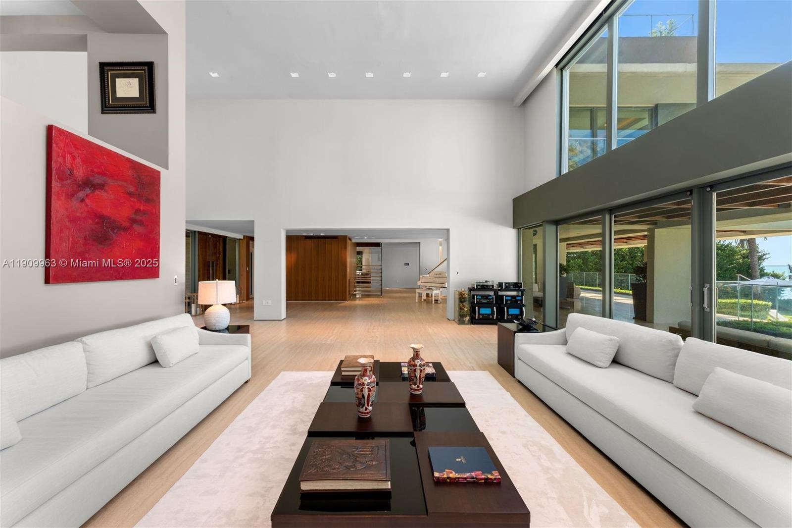 360 Harbor Drive Key Biscayne, FL 33149 - Photo 35 of 86 a living room with furniture and a large window