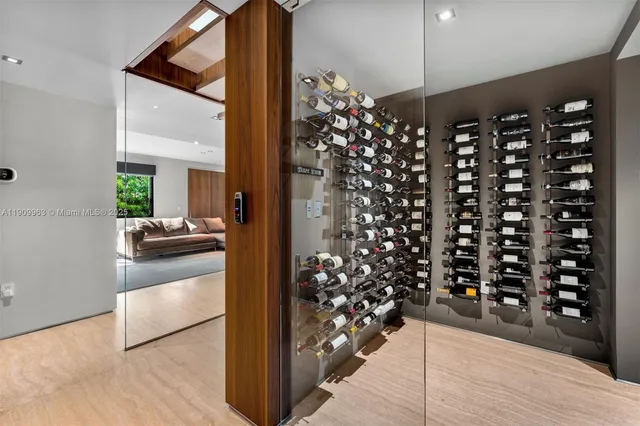 a bedroom with a large bed and a flat screen tv