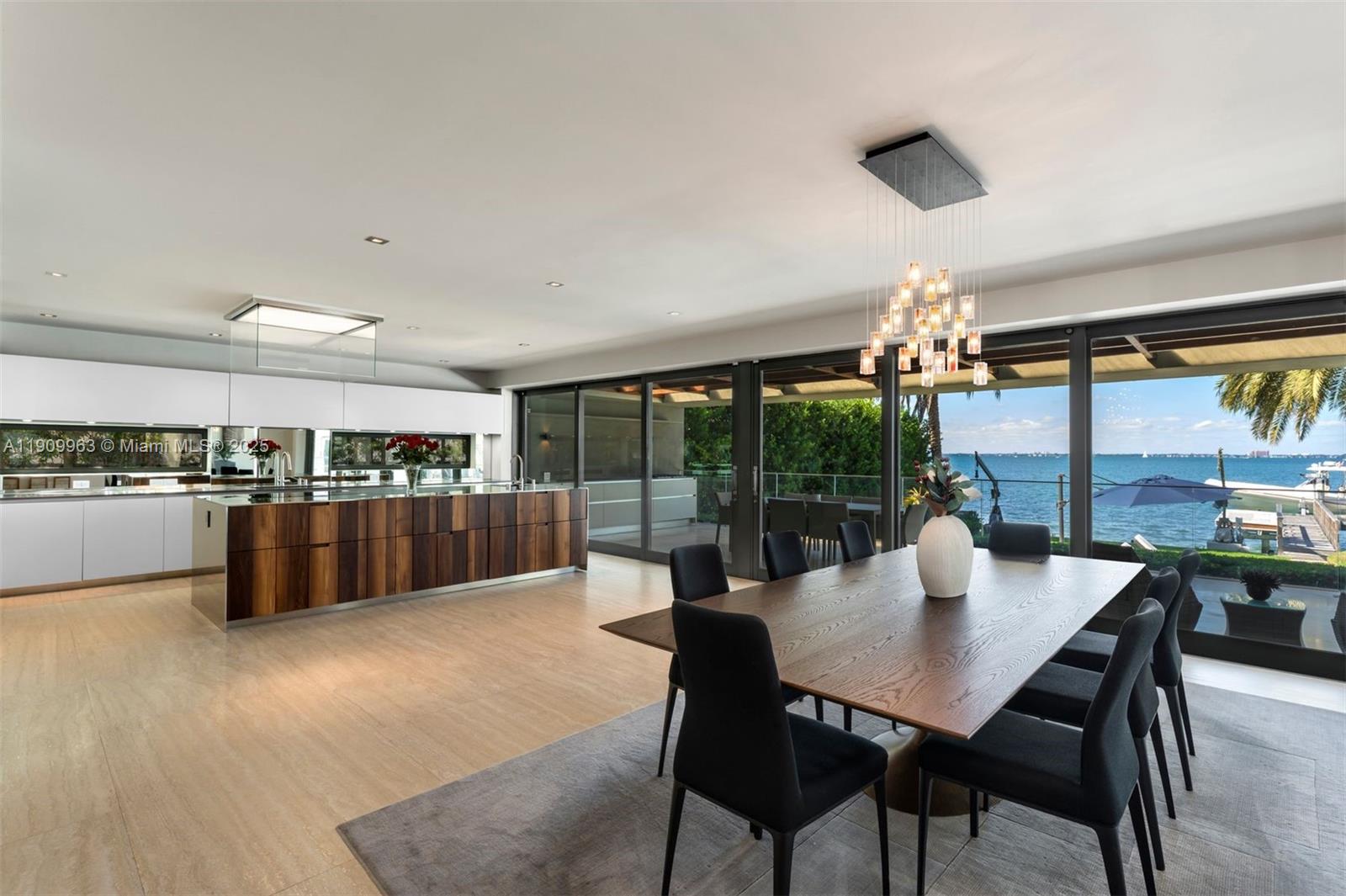360 Harbor Drive Key Biscayne, FL 33149 - Photo 39 of 86 a view of a dining room with furniture window and outside view