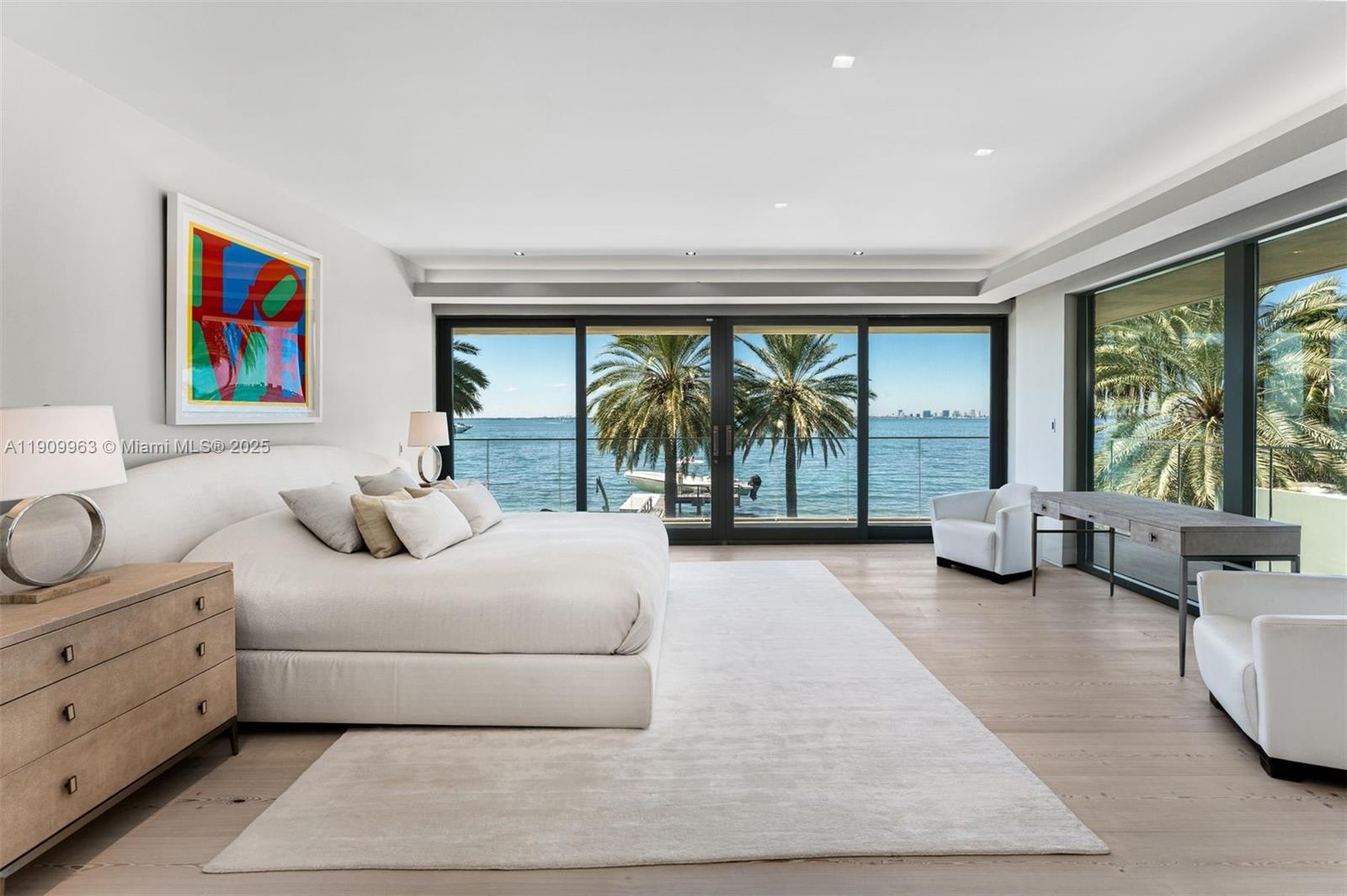 360 Harbor Drive Key Biscayne, FL 33149 - Photo 48 of 86 a bedroom with furniture and large windows