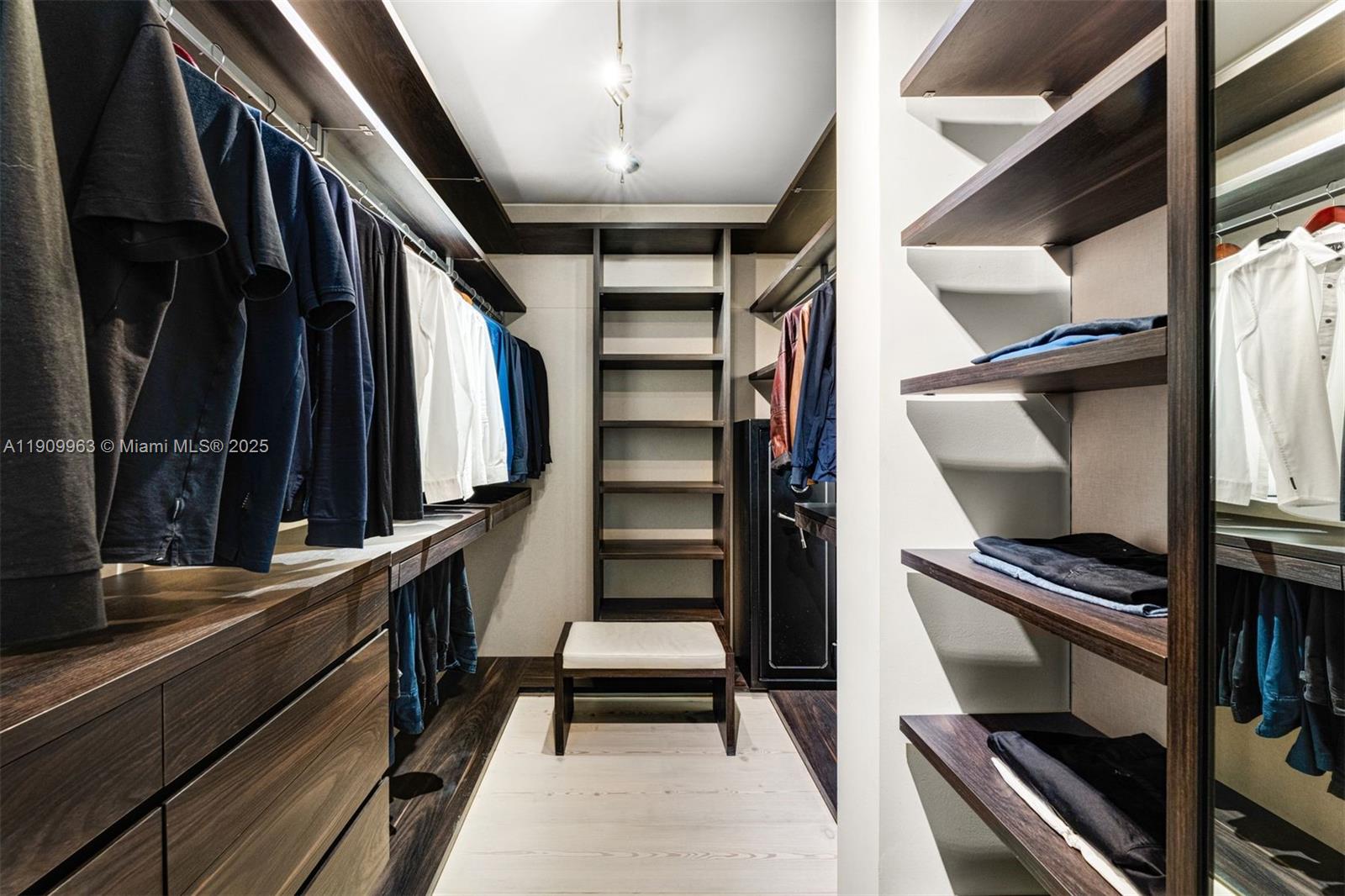 360 Harbor Drive Key Biscayne, FL 33149 - Photo 51 of 86 a view of walk in closet with clothes and shoes
