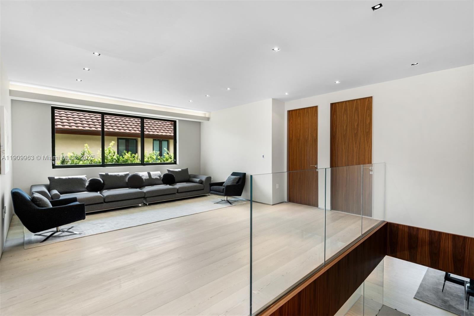 360 Harbor Drive Key Biscayne, FL 33149 - Photo 57 of 86 a living room with furniture and a flat screen tv