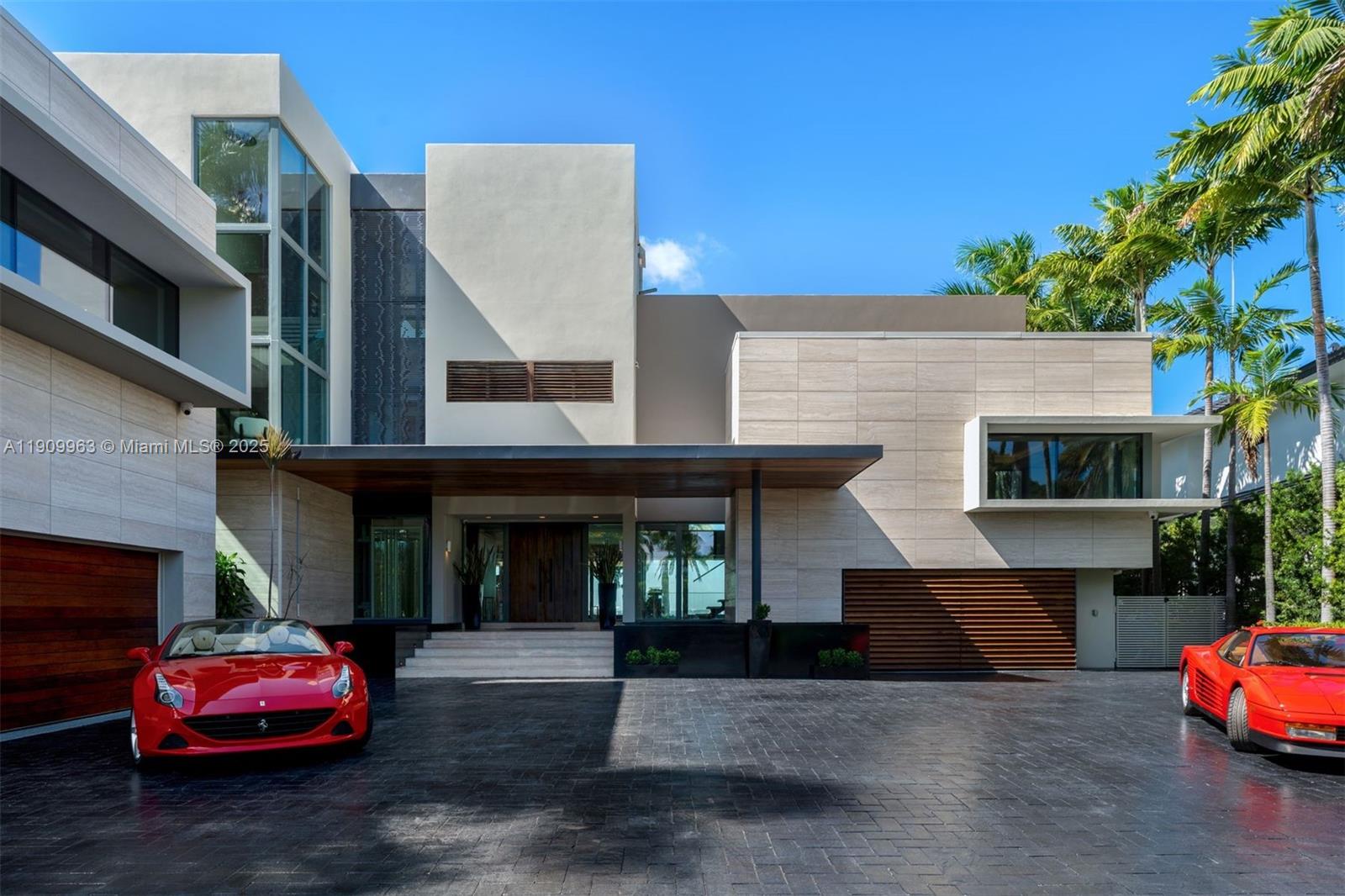 360 Harbor Drive Key Biscayne, FL 33149 - Photo 9 of 86 a view of a car park in front of house