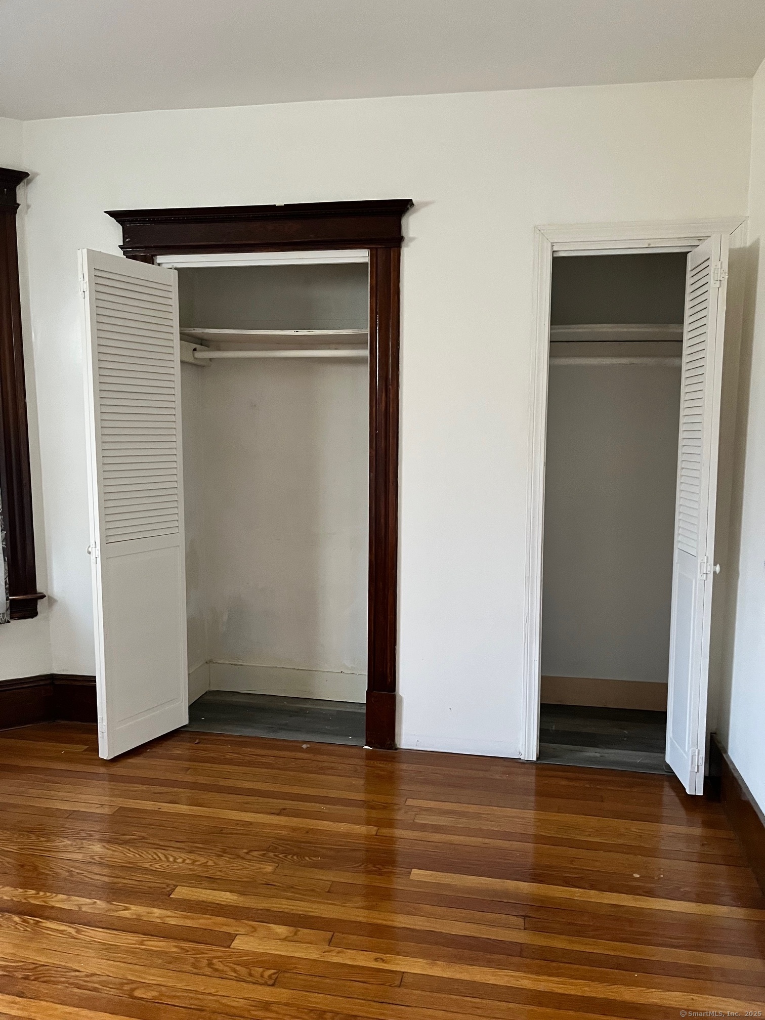 308 Edgewood Street, Unit 1 Hartford, CT 06112 - Photo 16 of 23 a view of empty room with wooden floor