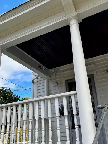 a close view of deck and hardwood