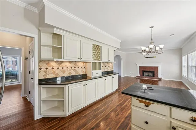 a kitchen with stainless steel appliances a refrigerator stove and sink