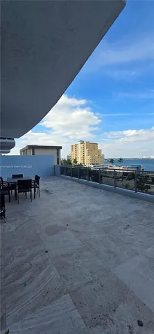 a view of a terrace with outdoor space