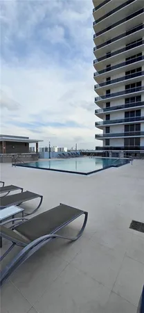a view of a terrace with sitting area