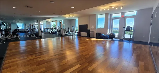 a view of a room with gym equipment