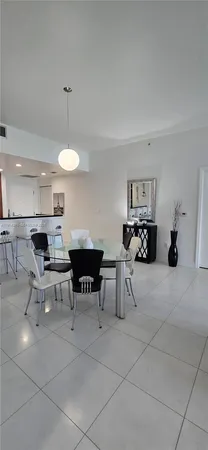 a view of kitchen with furniture and window