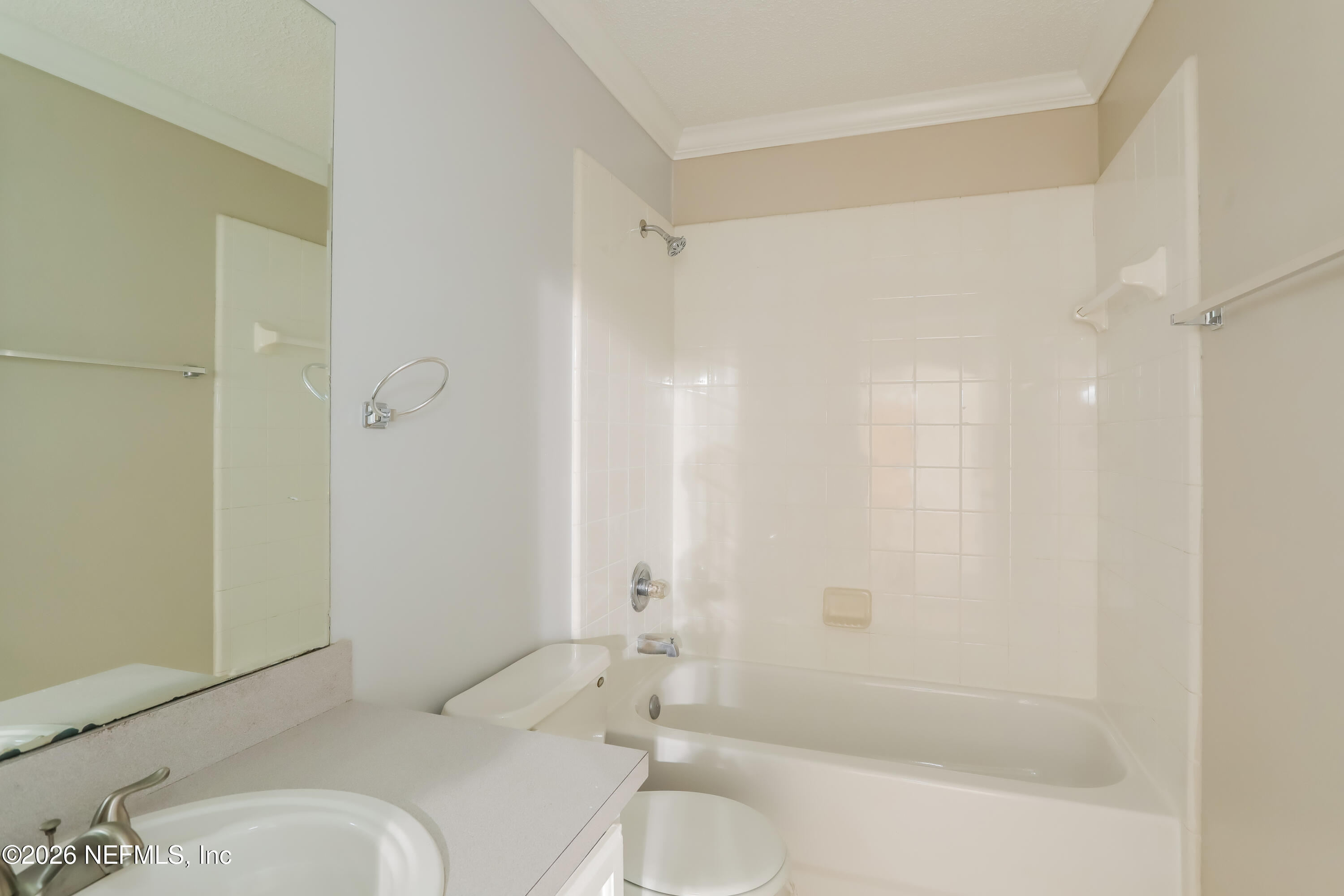 4088 Everett Avenue Middleburg, FL 32068 - Photo 13 of 16 a bathroom with a sink toilet and shower