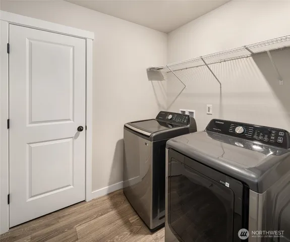 a utility room with dryer and washer