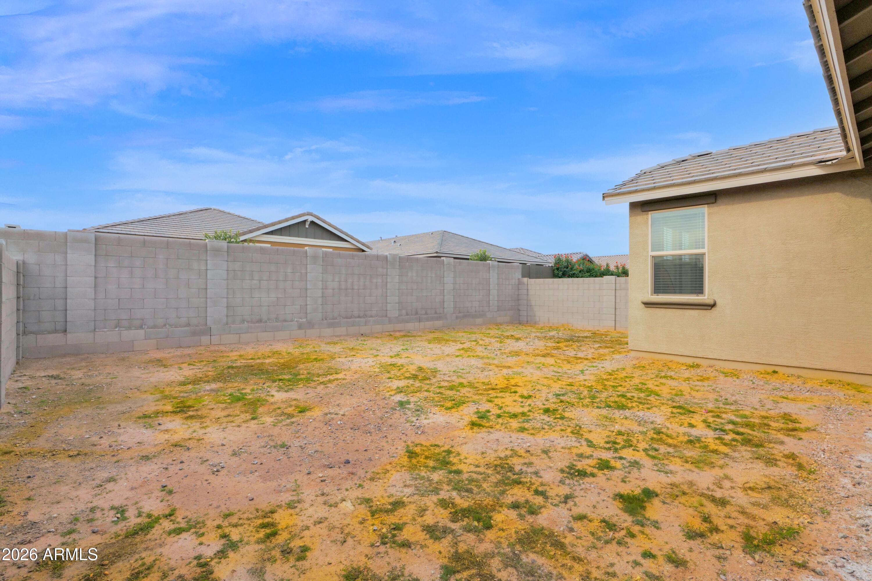 3461 West Oil Well Road San Tan Valley, AZ 85144 - Photo 22 of 25 a view of a house with a yard