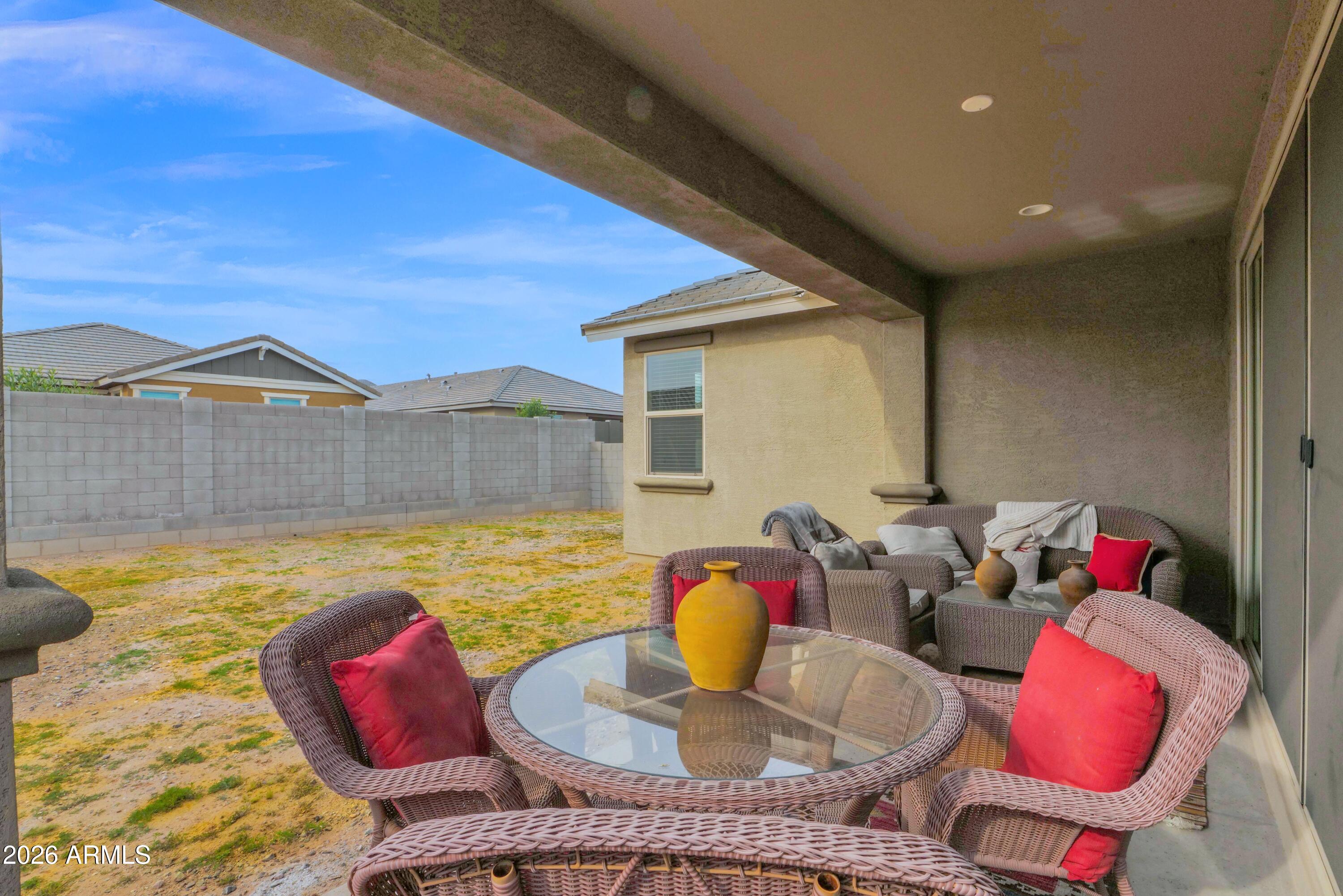 3461 West Oil Well Road San Tan Valley, AZ 85144 - Photo 23 of 25 a dining room with furniture and wooden floor