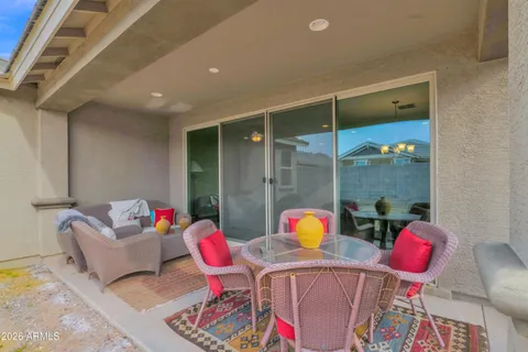 a living room with furniture and a table