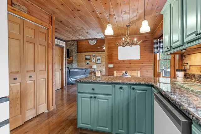 a bedroom with a bed and a fireplace