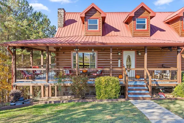 front view of a house with a yard