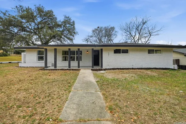 a front view of house with yard