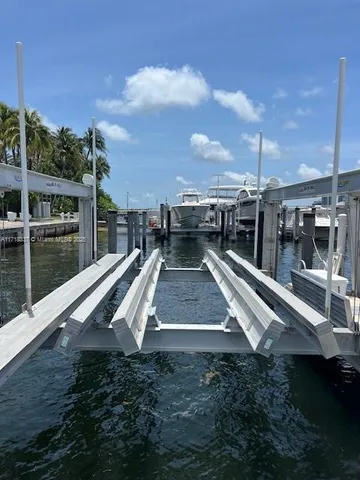 a view of a living room with furniture and floor