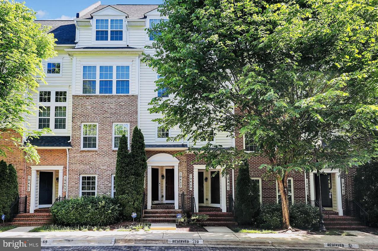 19461 Dover Cliffs Circle, Unit 19461 Germantown, MD 20874 - Photo 1 of 13 a front view of a building with street view