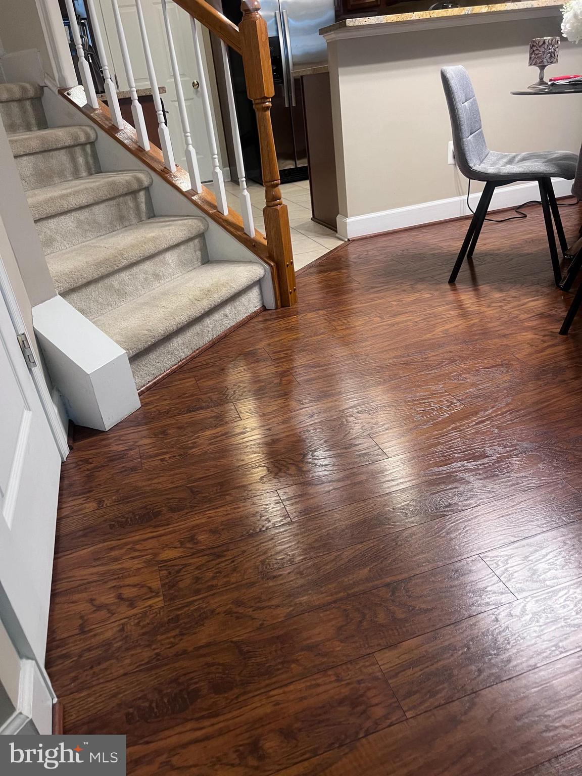 19461 Dover Cliffs Circle, Unit 19461 Germantown, MD 20874 - Photo 4 of 13 a view of entryway and hall with wooden floor