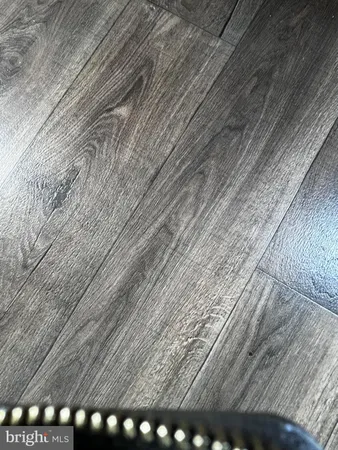 a view of outdoor space with wooden floor
