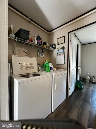 a kitchen with a refrigerator and cabinets
