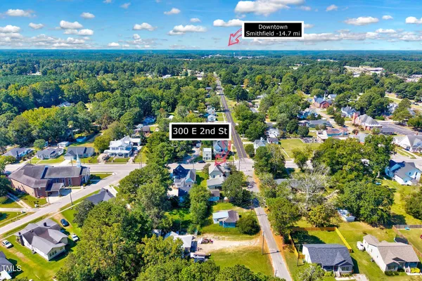 a view of porch with wooden floor