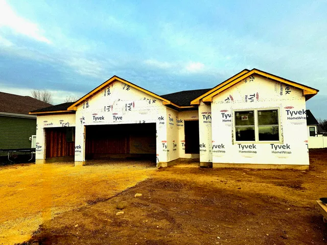 a view of large house with pool