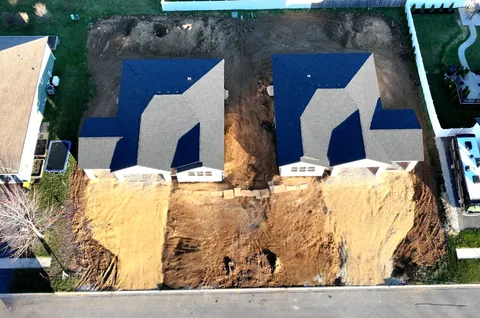 a view of a golf course with a lake