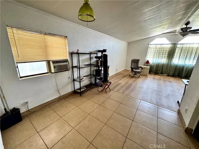 a view of a livingroom with furniture and windows