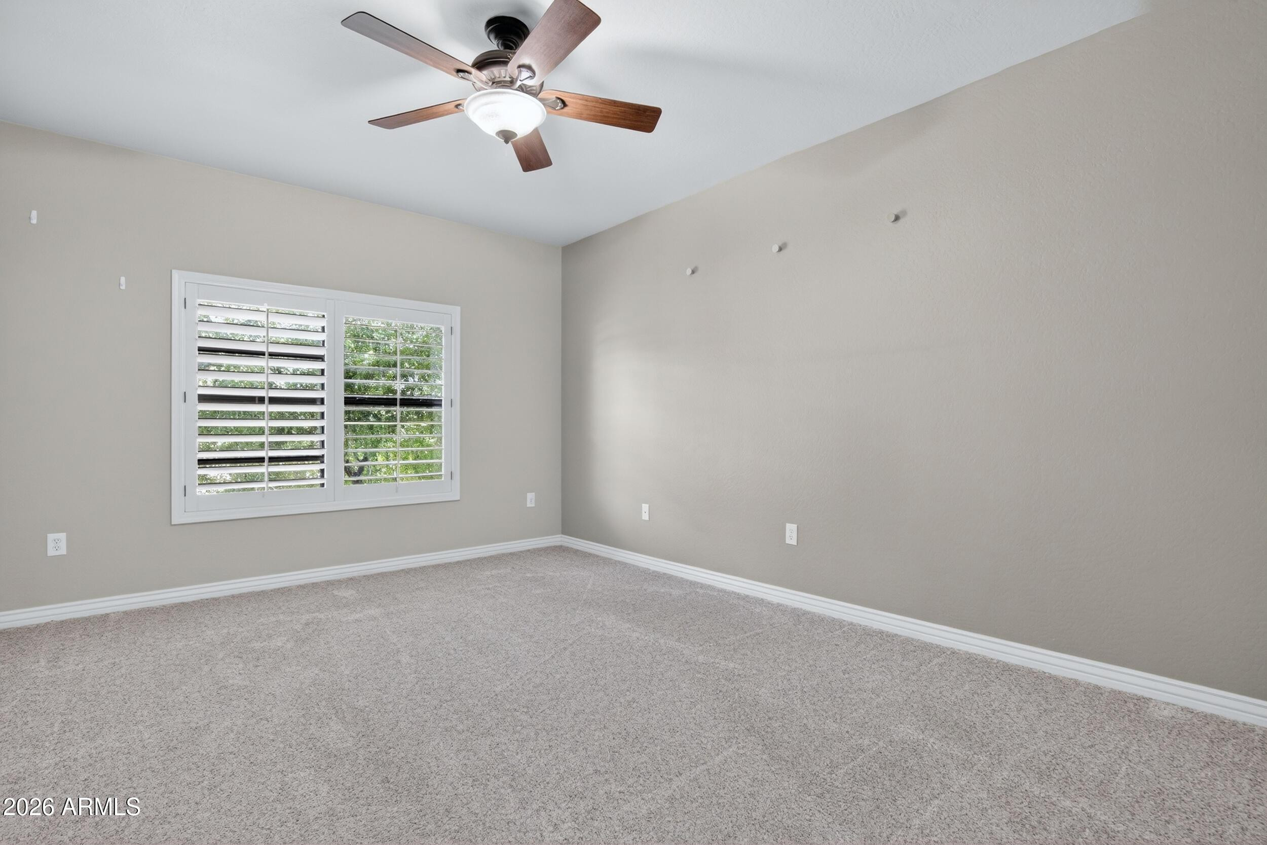 21320 North 56th Street, Unit 2125 Phoenix, AZ 85054 - Photo 22 of 39 a view of an empty room with a window