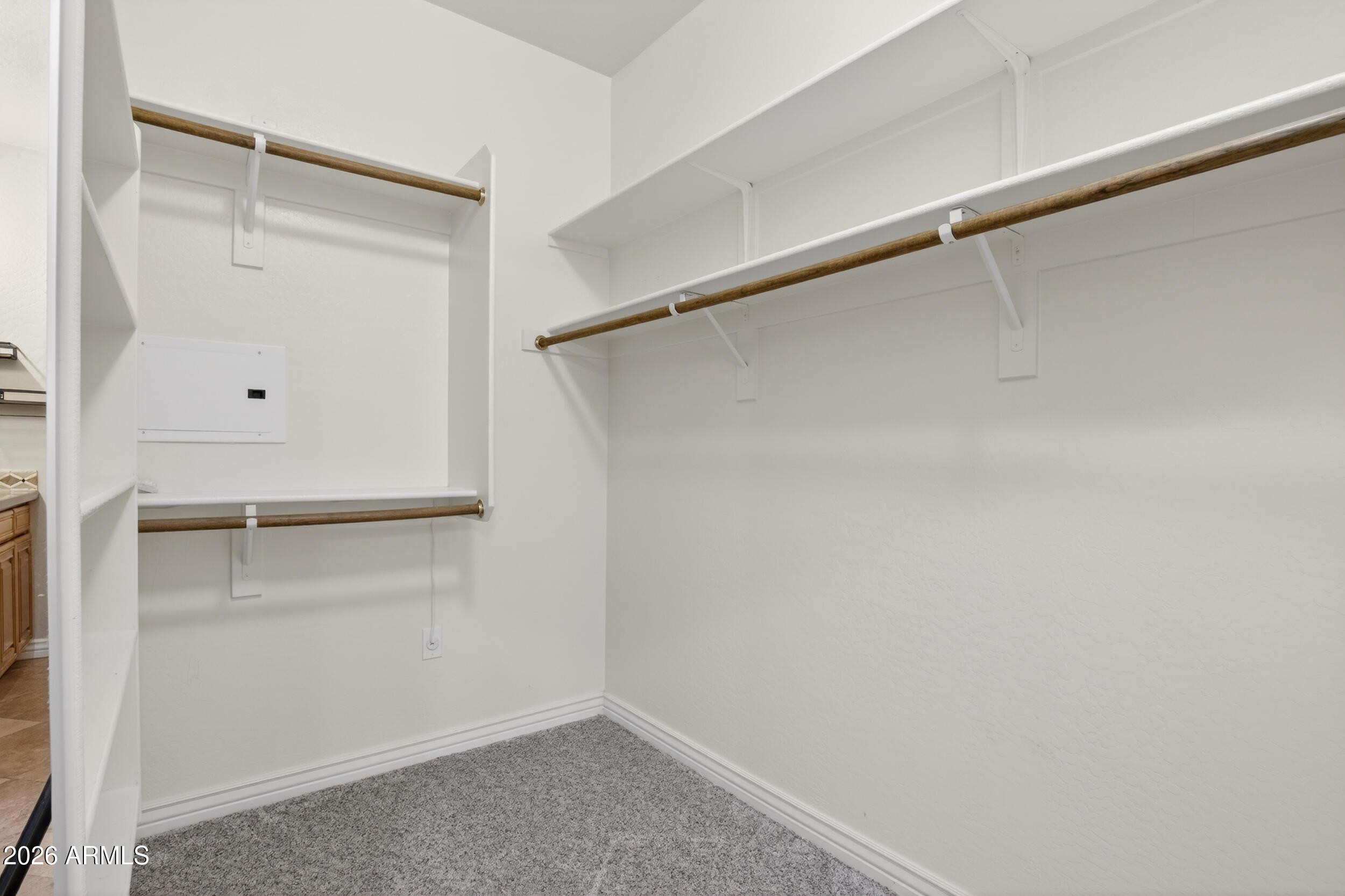 21320 North 56th Street, Unit 2125 Phoenix, AZ 85054 - Photo 30 of 39 a view of an empty walk in closet
