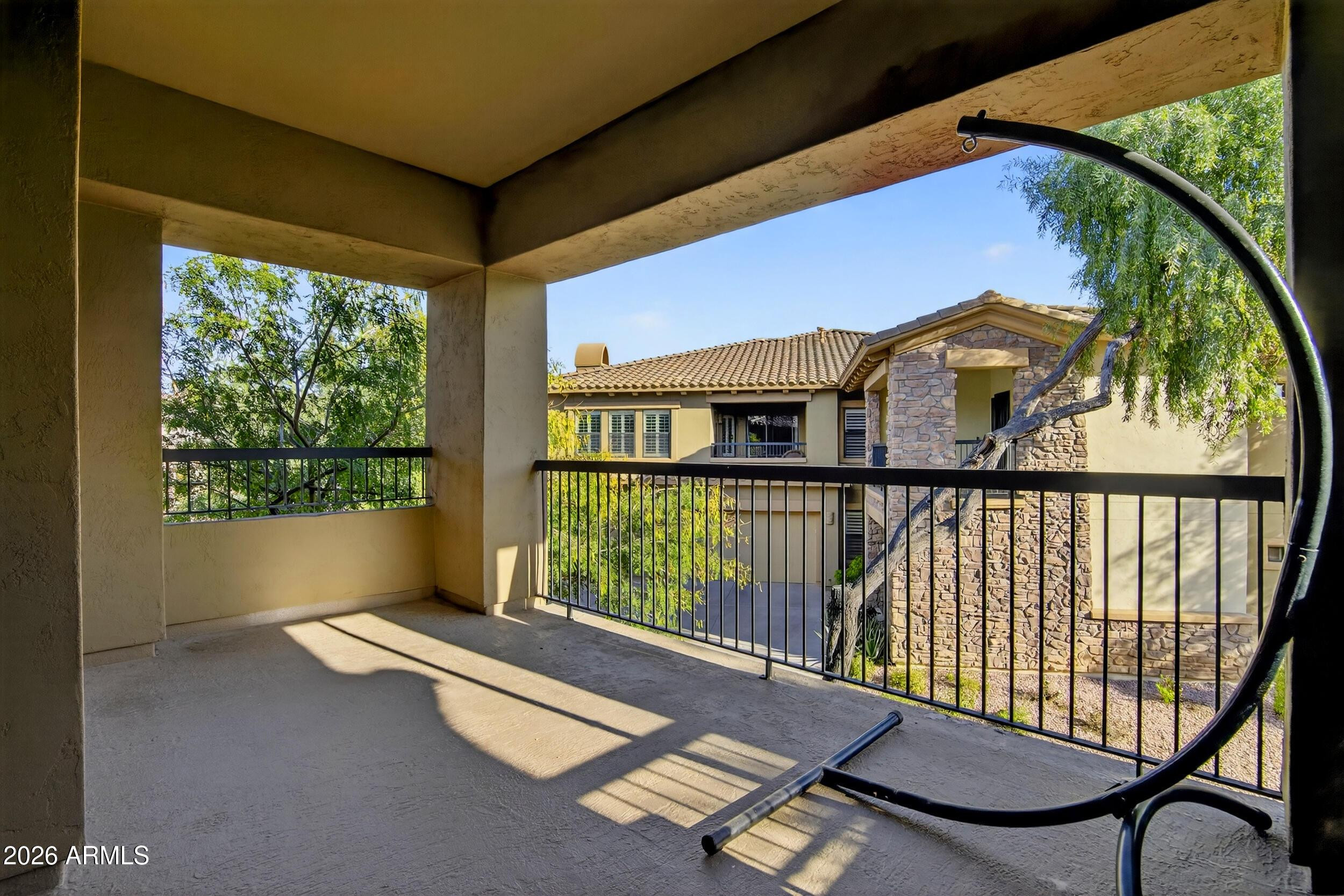 21320 North 56th Street, Unit 2125 Phoenix, AZ 85054 - Photo 35 of 39 a view of balcony with floor to ceiling window and wooden floor
