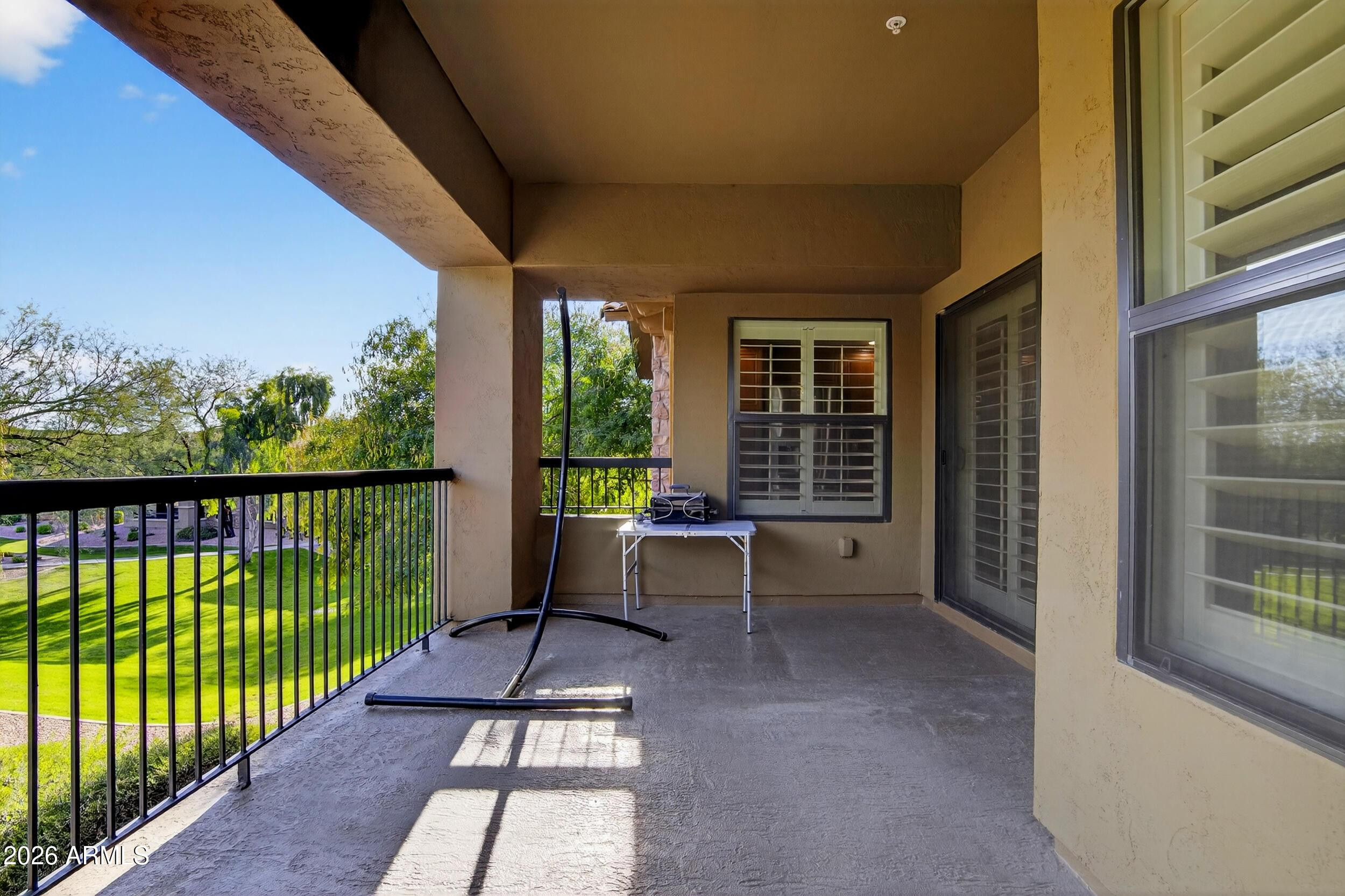 21320 North 56th Street, Unit 2125 Phoenix, AZ 85054 - Photo 37 of 39 a view of a balcony with chairs