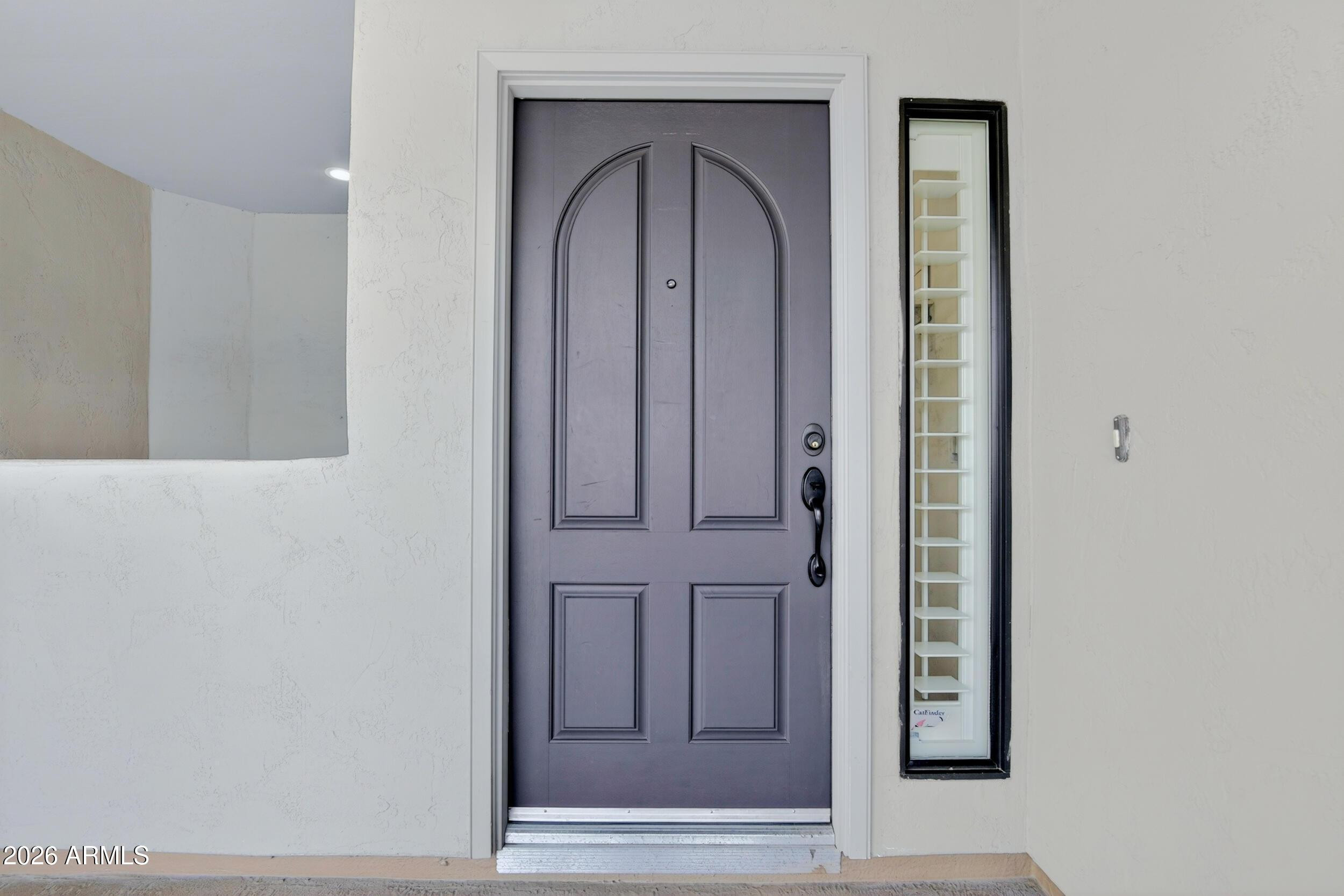 21320 North 56th Street, Unit 2125 Phoenix, AZ 85054 - Photo 6 of 39 a view of a entryway door