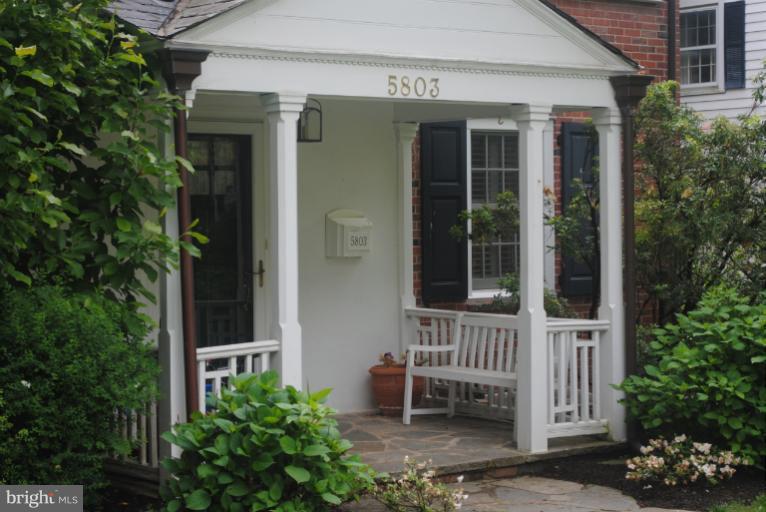 5803 Kenmore Road Baltimore, MD 21210 - Photo 19 of 29 front view of a house with a porch