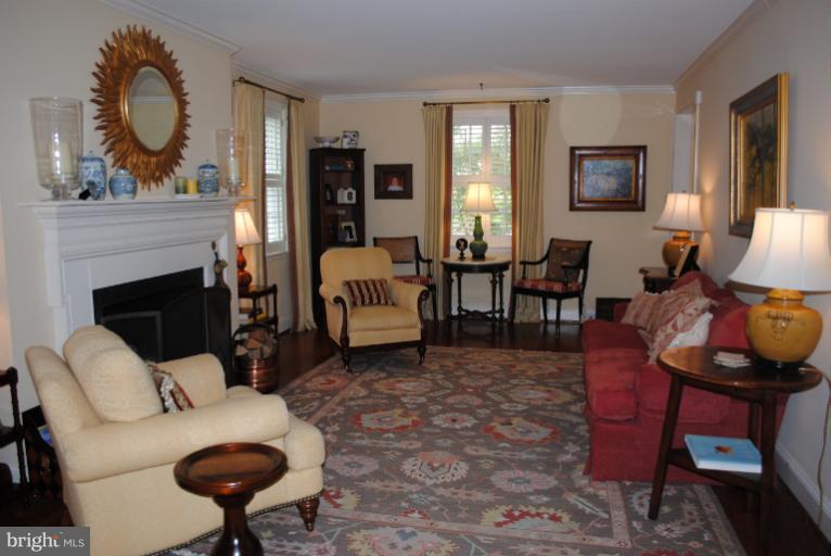 5803 Kenmore Road Baltimore, MD 21210 - Photo 4 of 29 a living room with furniture and a fireplace