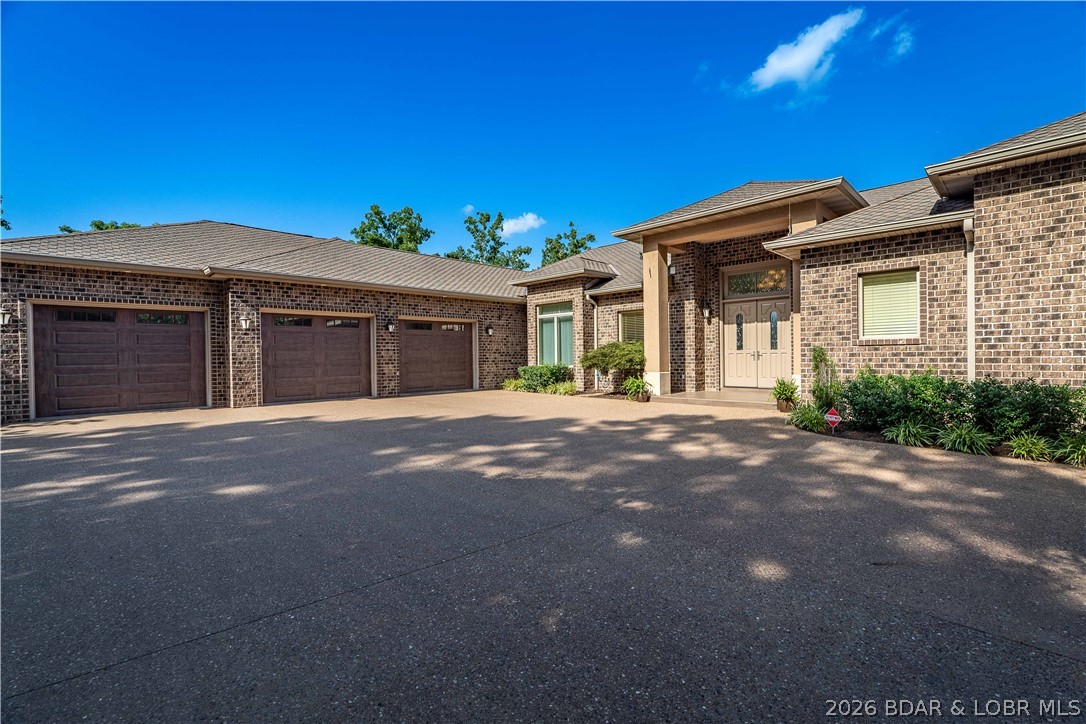 1015 Anemone Road Lake Ozark, MO 65049 - Photo 79 of 100 Level Driveway, ample parking
