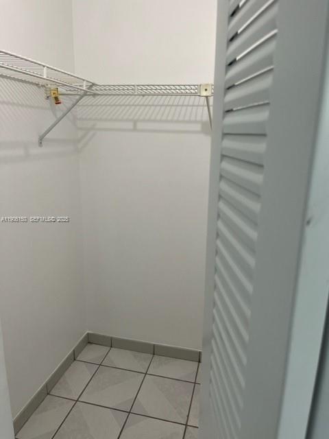 961 West 44th Street Hialeah, FL 33012 - Photo 15 of 35 a view of a room with racks on the wall