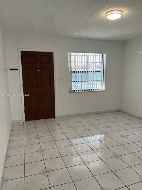 961 West 44th Street Hialeah, FL 33012 - Photo 16 of 35 a view of an empty room and window