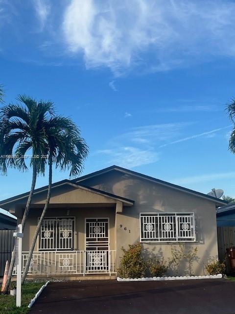 961 West 44th Street Hialeah, FL 33012 - Photo 2 of 35 a front view of a house