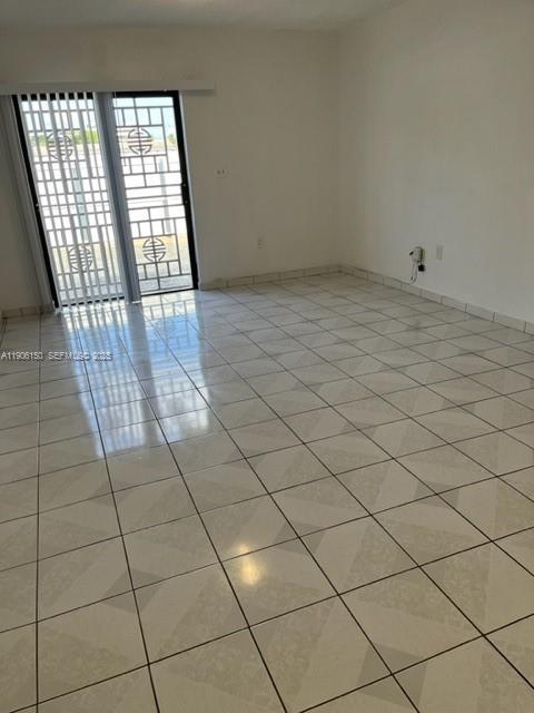 961 West 44th Street Hialeah, FL 33012 - Photo 21 of 35 a view of an empty room and window