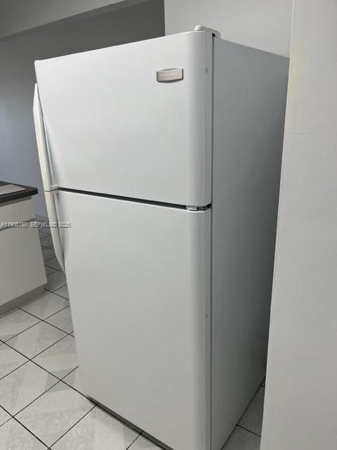 961 West 44th Street Hialeah, FL 33012 - Photo 8 of 35 a white refrigerator freezer sitting next to a white wall