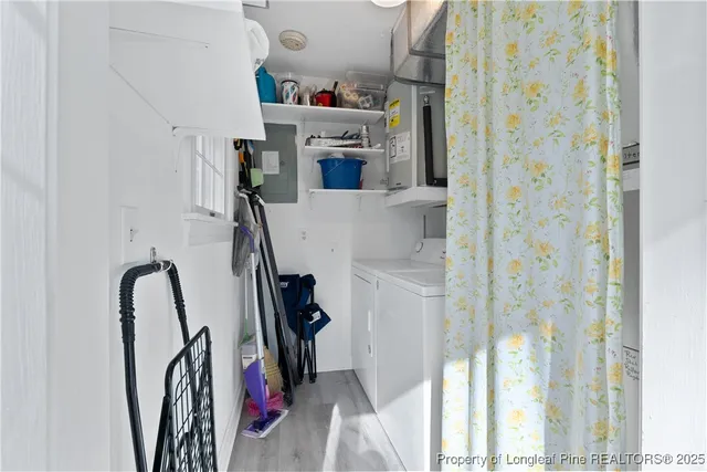 a view of living room with furniture and floor to ceiling window